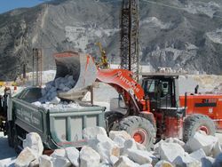 Hitachi ZW550 loading waste marble