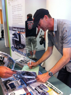 Patrick Dyer signing copies of his new Scania book